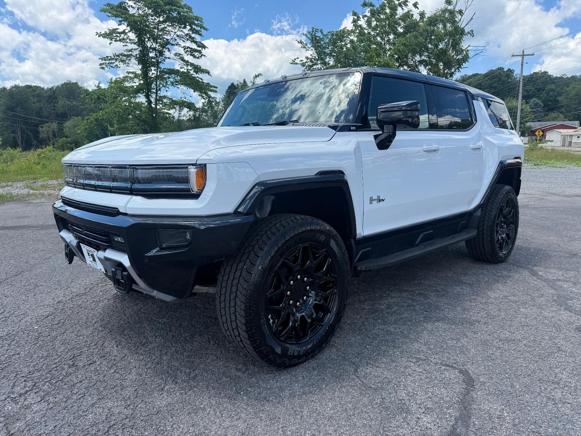 2026 GMC HUMMER EV SUV 2X in Interstellar White — front three-quarter view