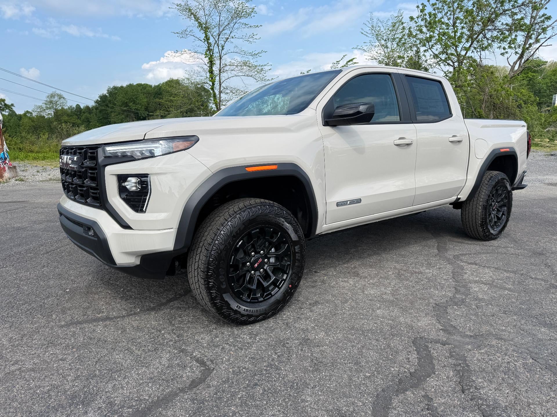 2026 GMC Canyon Elevation in Coastal Dune — front three-quarter view