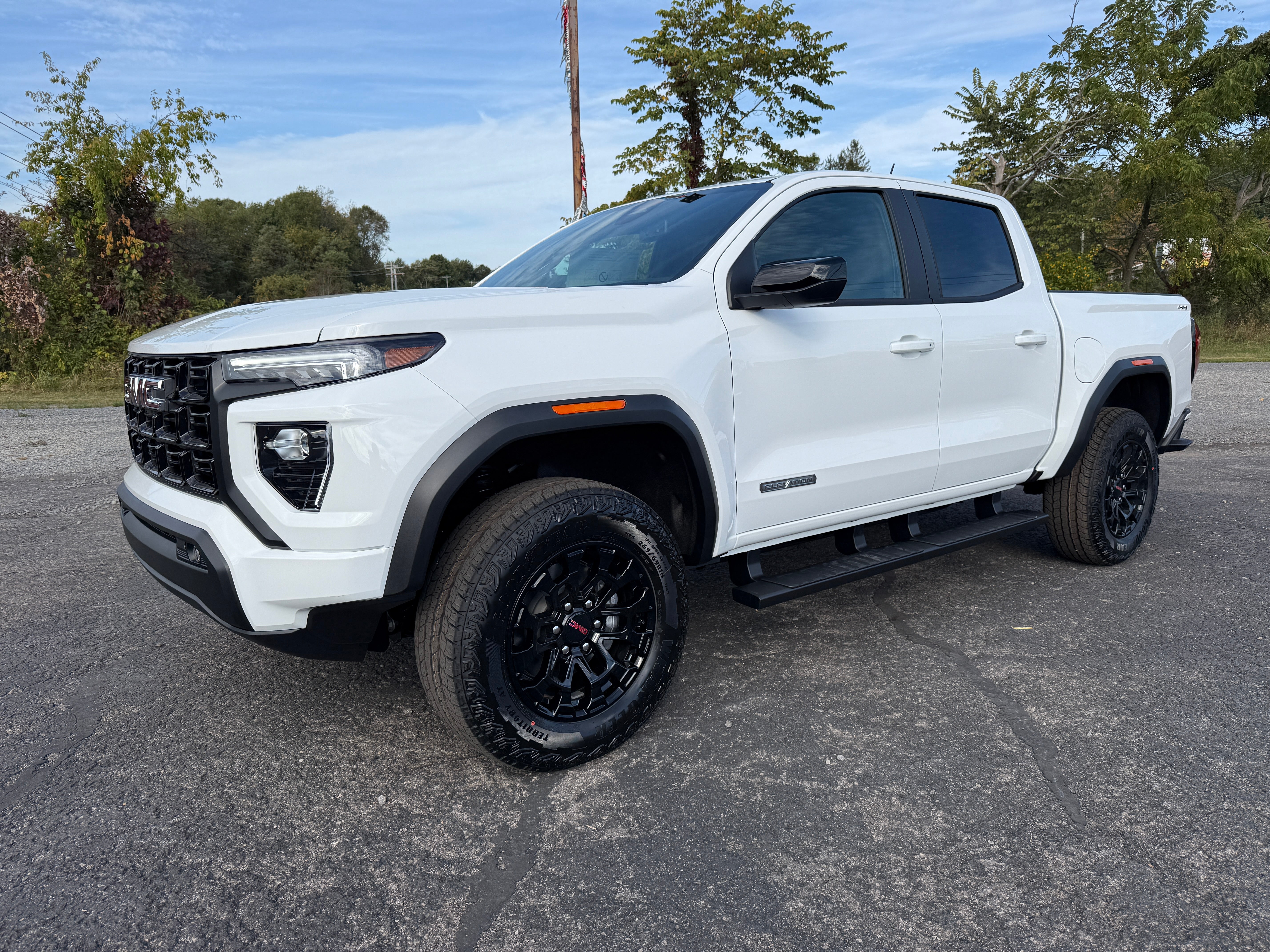 2026 GMC Canyon Elevation in Summit White — front three-quarter view