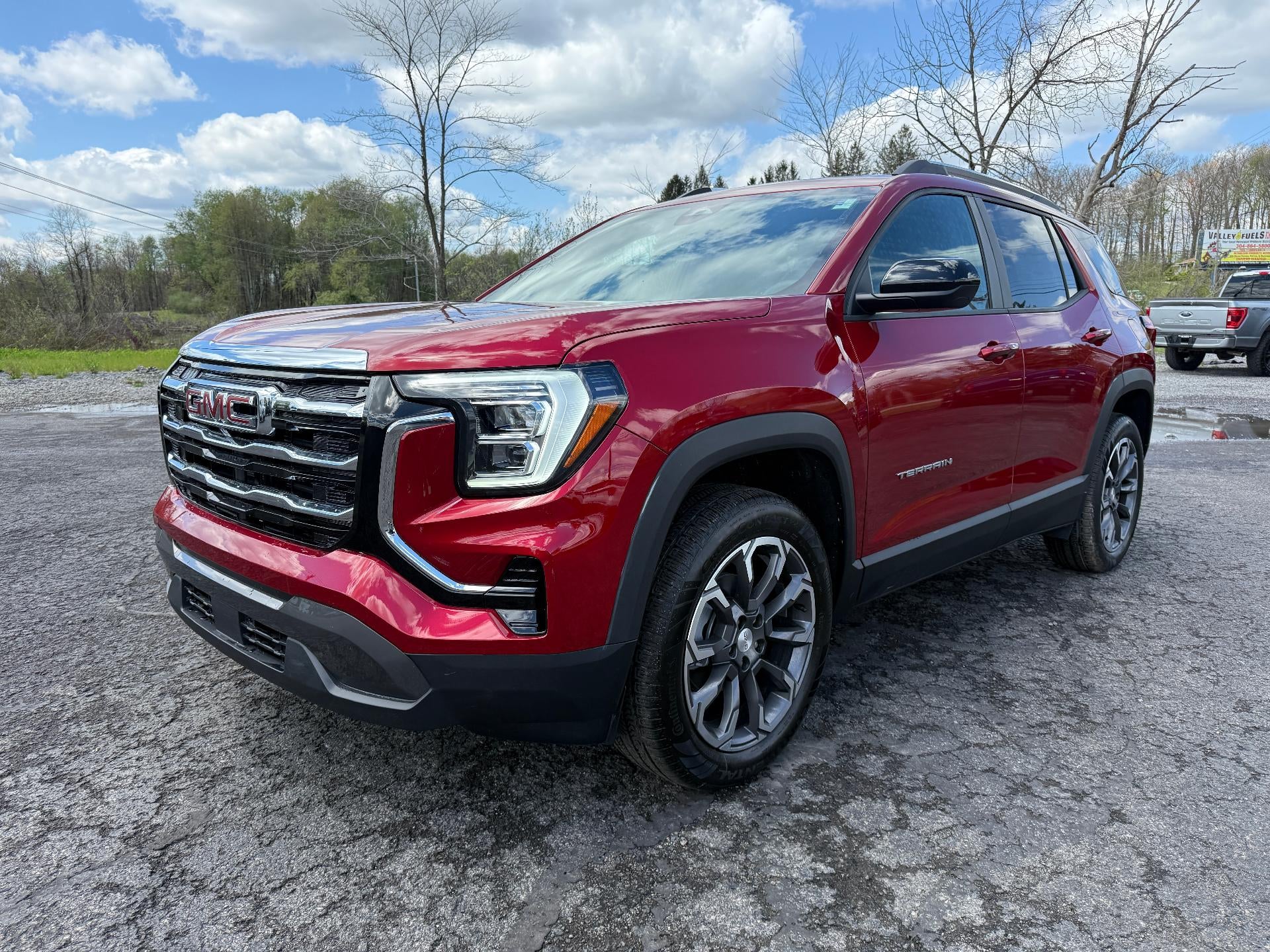 2026 GMC Terrain Elevation in Volcanic Red Tintcoat — front three-quarter view
