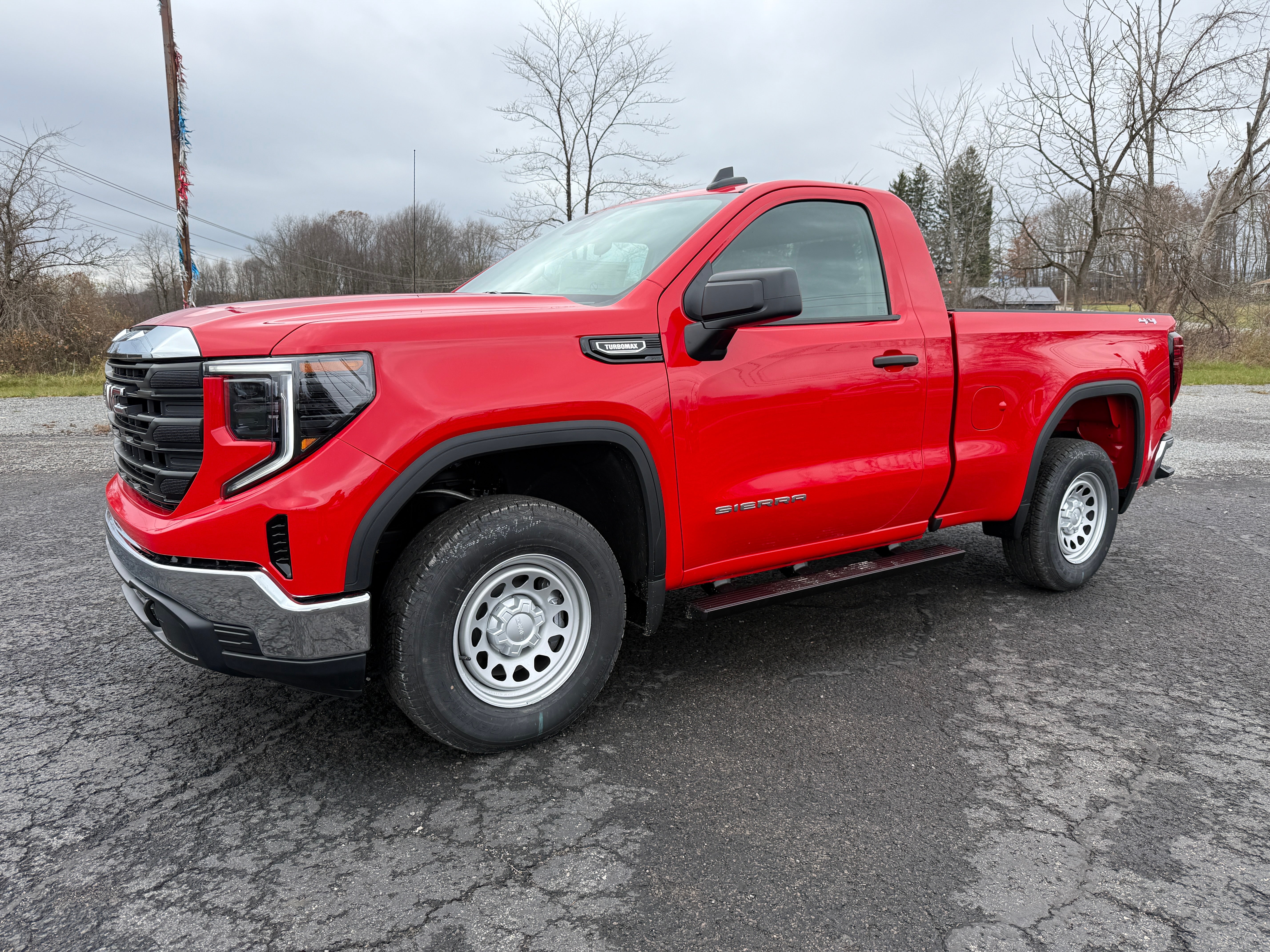 2026 GMC Sierra 1500 Pro in Cardinal Red — front three-quarter view
