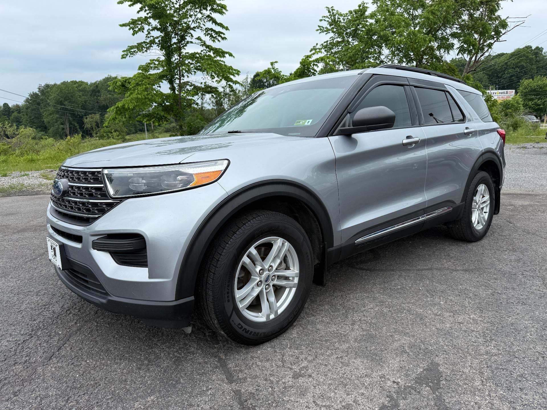 2022 Ford Explorer XLT 4WD in Iconic Silver Metallic — front three-quarter view